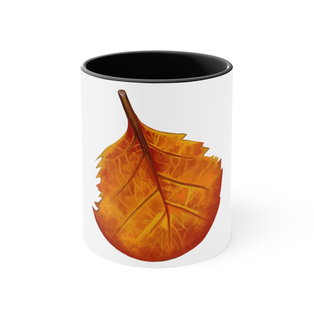 Orange Leaf Accent Coffee Mug with white ceramic exterior and vibrant orange interior and handle, showcasing a stylish two-tone design.