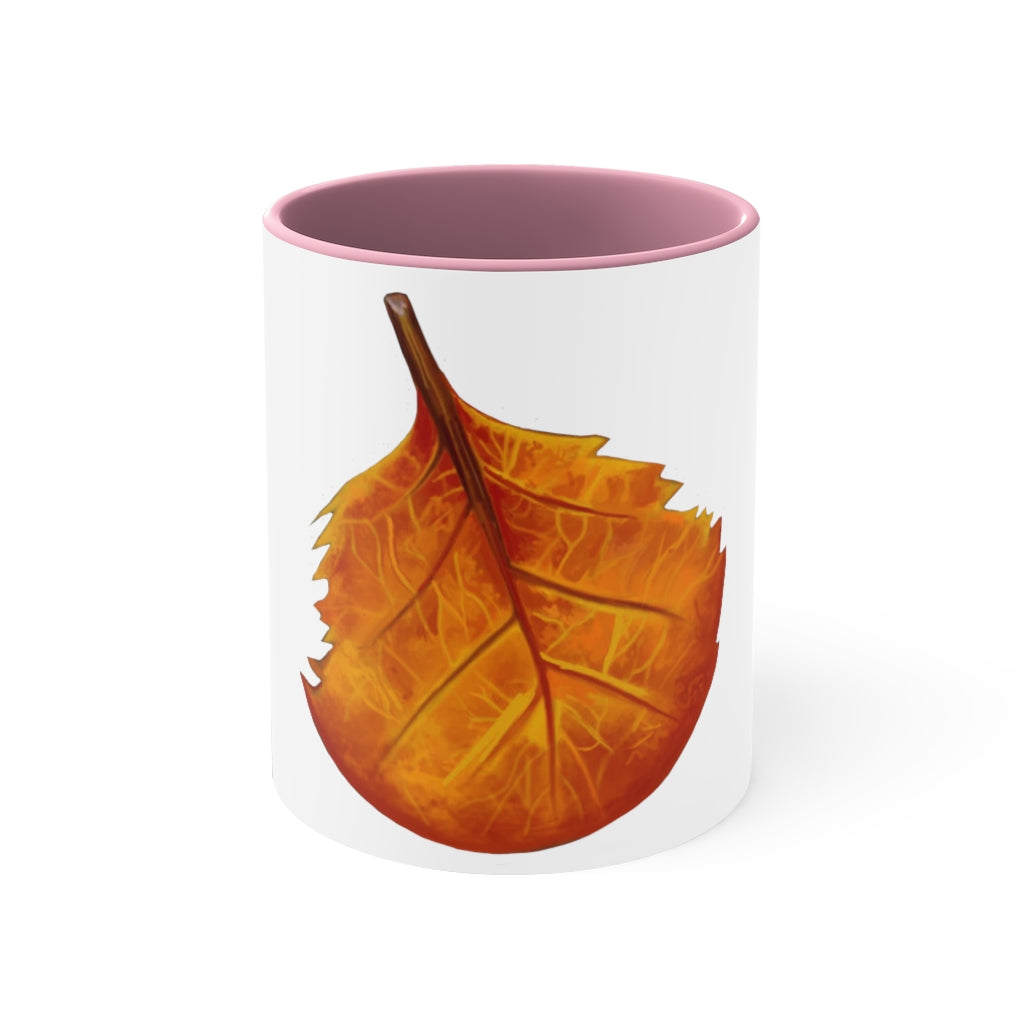 Orange Leaf Accent Coffee Mug with white ceramic exterior and vibrant orange interior and handle, showcasing a stylish two-tone design.