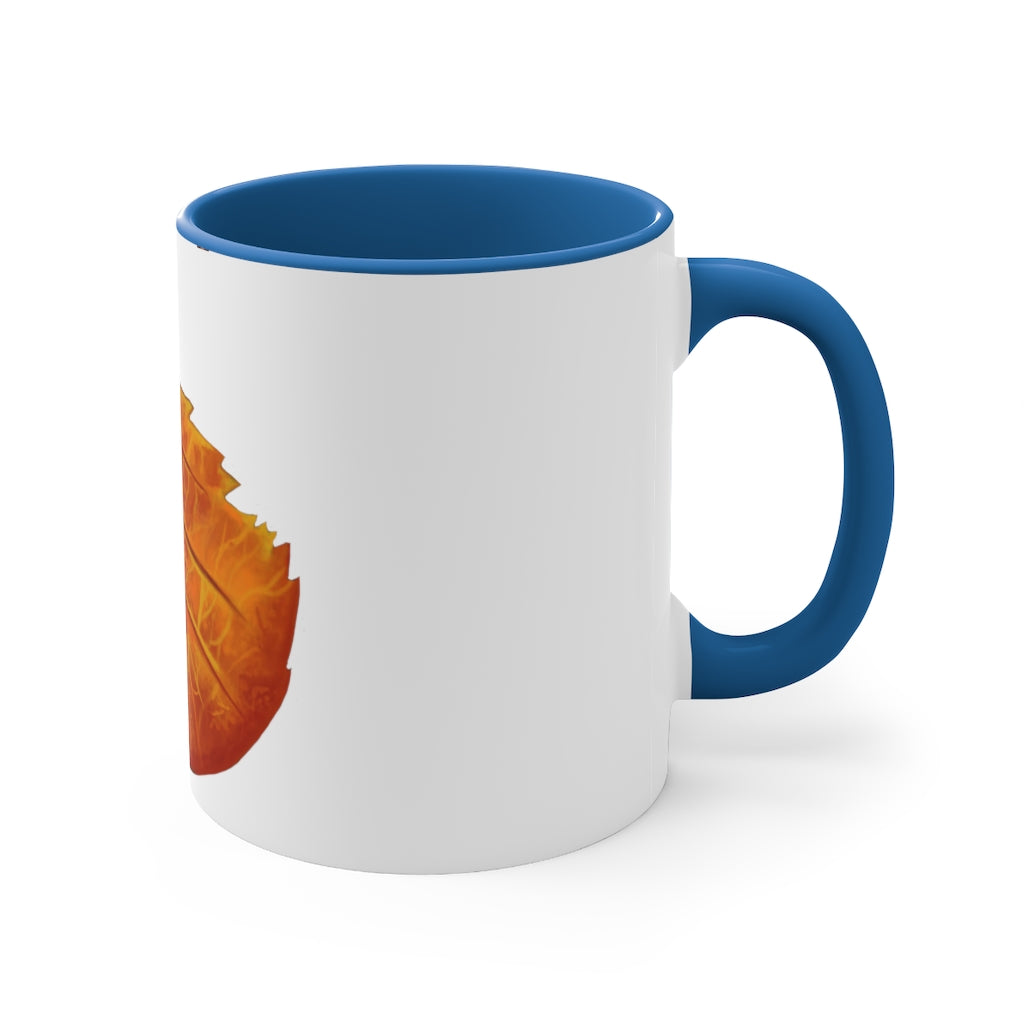 Orange Leaf Accent Coffee Mug with white ceramic exterior and vibrant orange interior and handle, showcasing a stylish two-tone design.