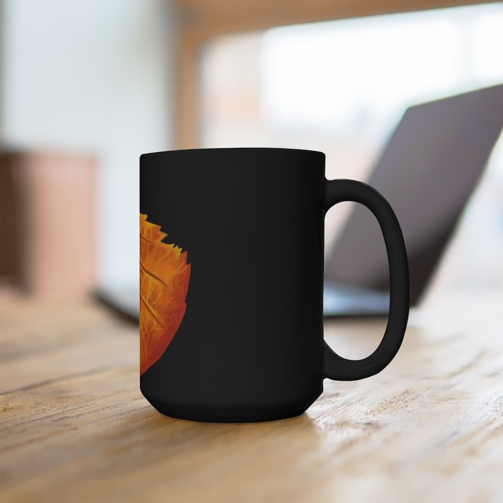 Orange Leaf Black Mug 15oz with rounded corners and C-handle, perfect for coffee and tea.