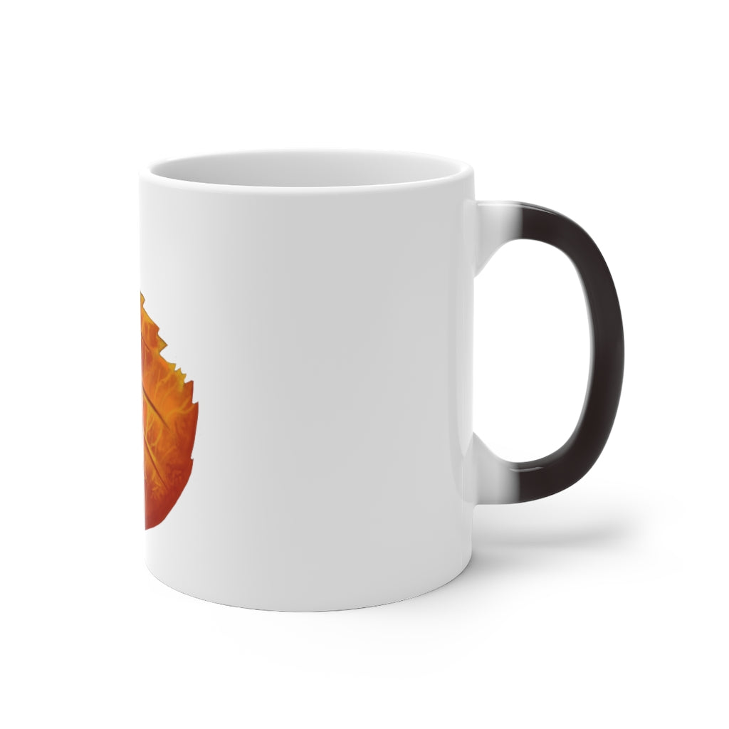 Orange Leaf Color Changing Mug displaying vibrant colors when filled with hot liquid, featuring a C-handle and rounded corners.