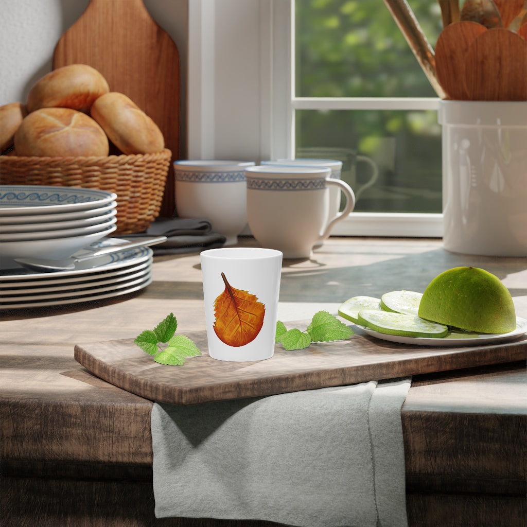 Ceramic Orange Leaf Shot Glass with customizable white or black interior, perfect for events and gifts.