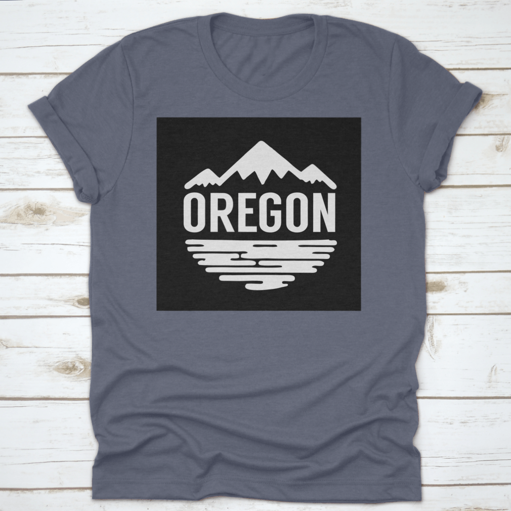 Cotton t-shirt featuring white silhouettes of mountains and water, representing Oregon's natural beauty.