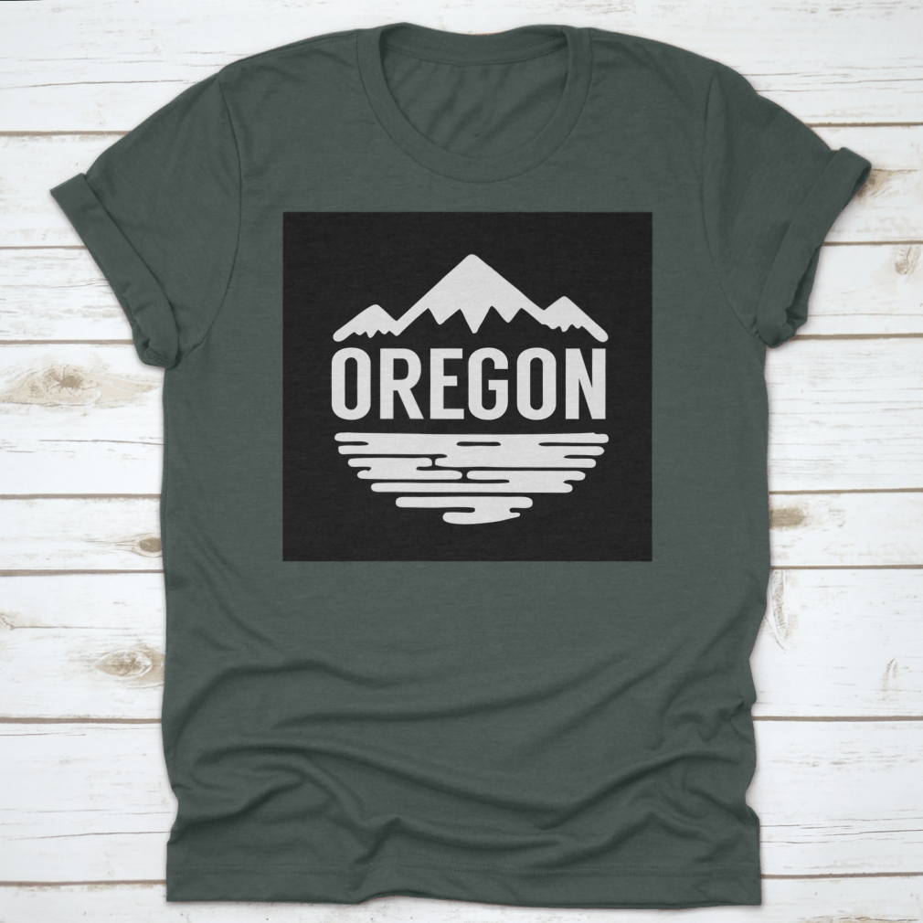 Cotton t-shirt featuring white silhouettes of mountains and water, representing Oregon's natural beauty.