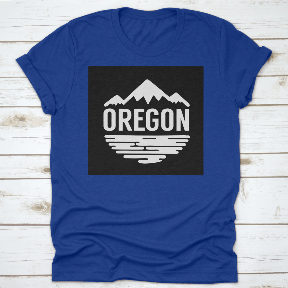 Cotton t-shirt featuring white silhouettes of mountains and water, representing Oregon's natural beauty.