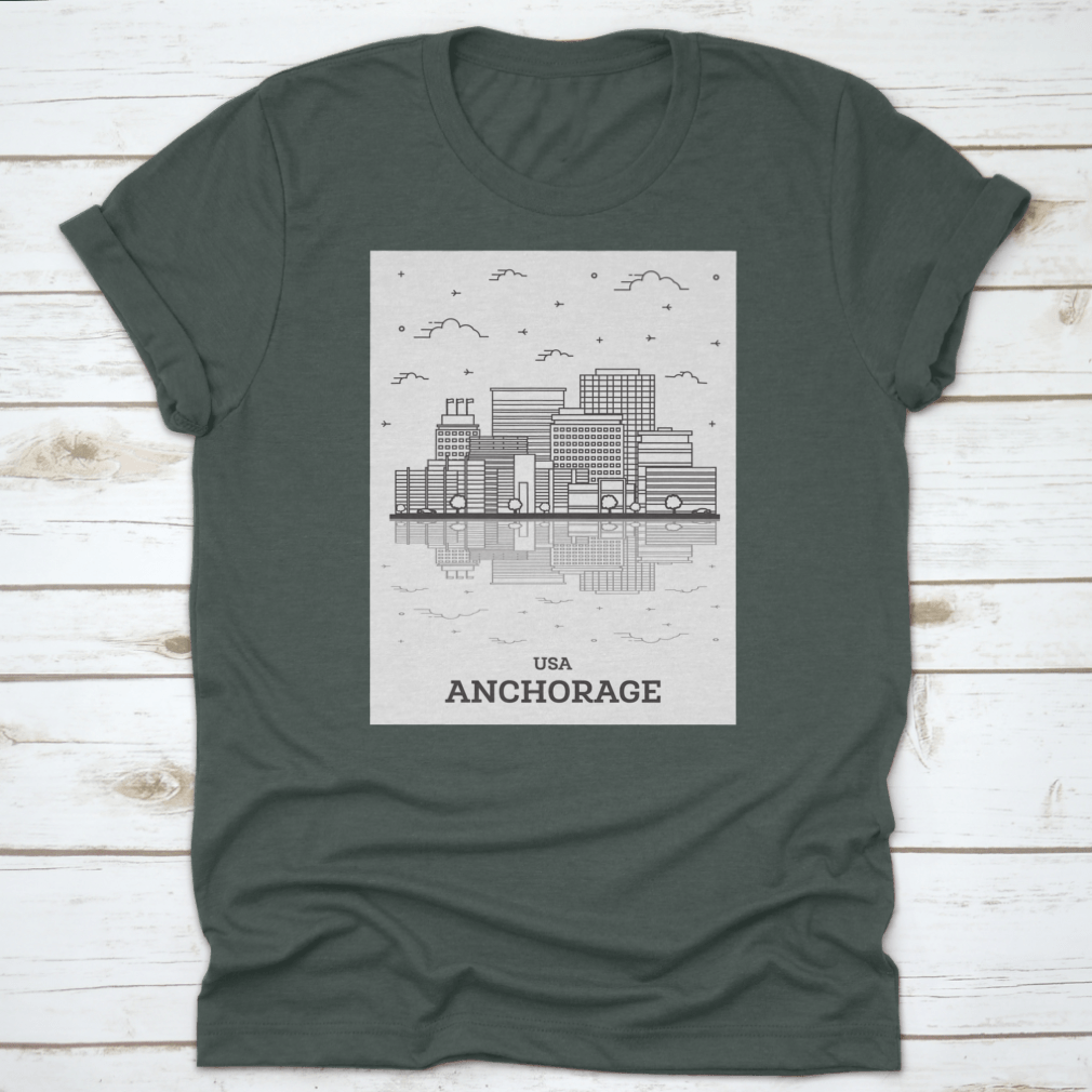 A stylish t-shirt featuring the skyline of Anchorage, Alaska, showcasing modern buildings against a clear sky.