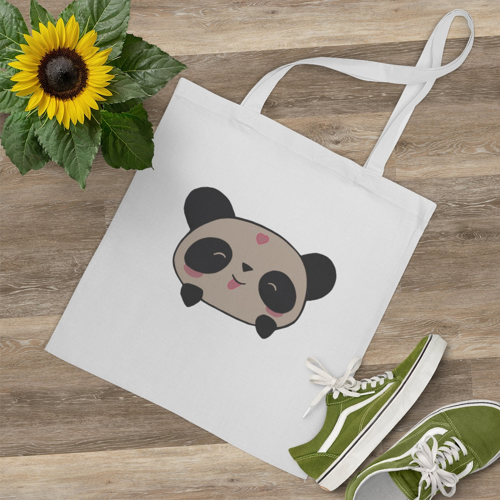 A stylish Panda Tote Bag made of 100% cotton with long handles and cross-stitched design, available in various colors.