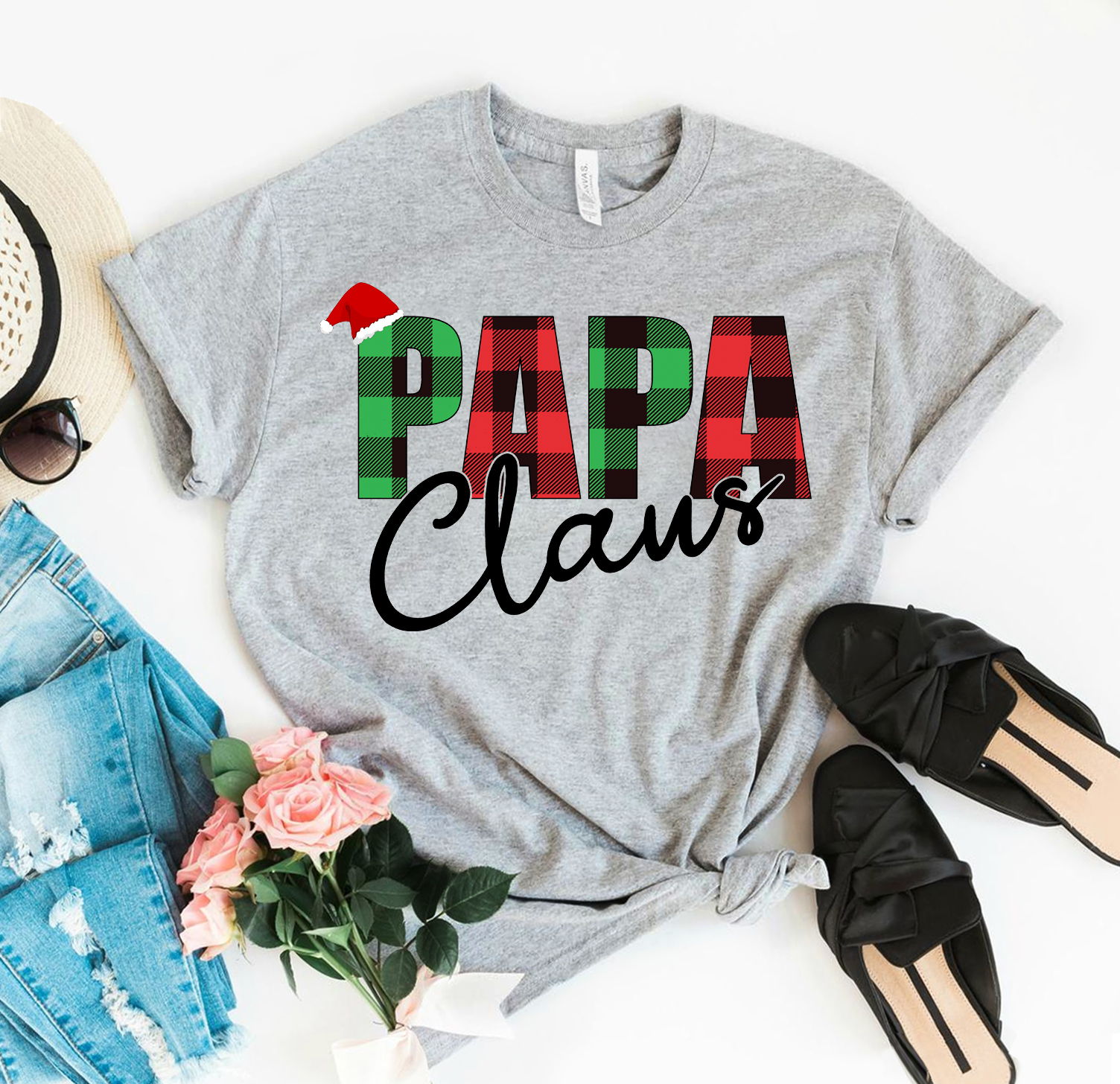 Papa Claus Christmas T-shirt made of premium ring spun cotton with a festive design, available in various sizes.