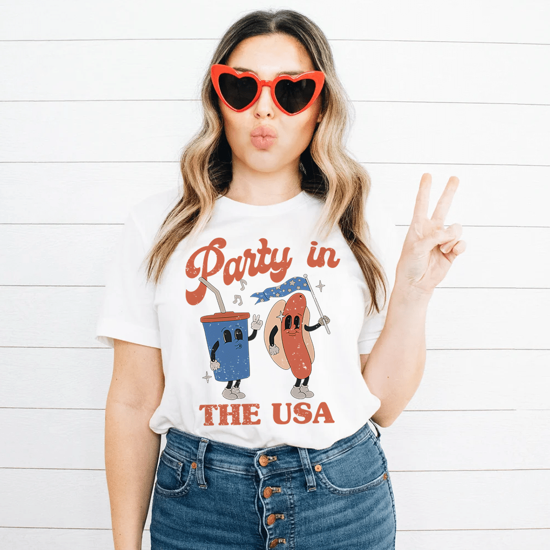 Party In The USA T-Shirt featuring soft ring-spun cotton, double stitching, and vibrant DTG print, available in various sizes.