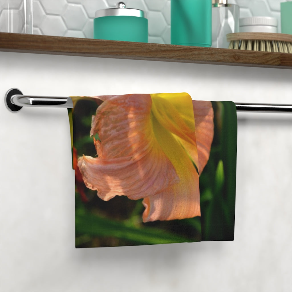 Peach and yellow flower face towel featuring a soft polyester front and absorbent cotton back, ideal for customization.