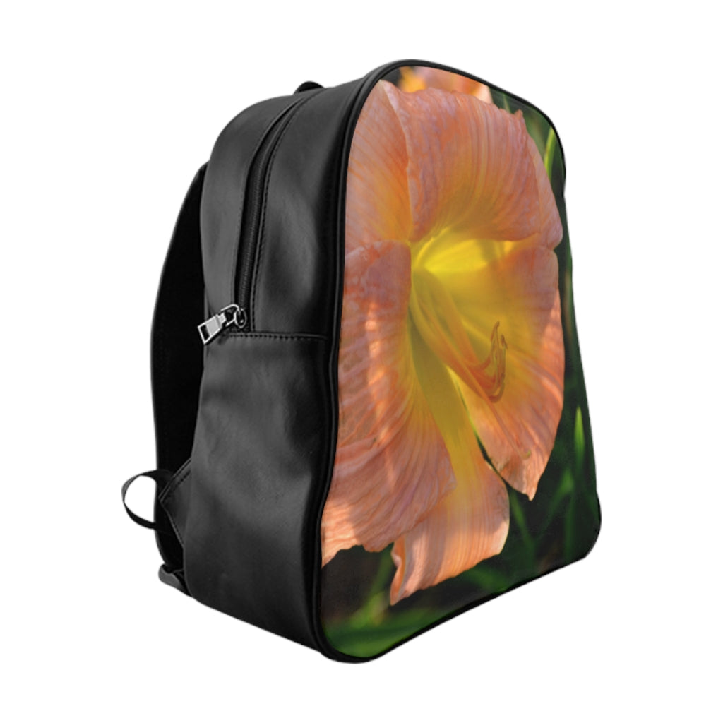 Peach and yellow floral school backpack with padded back and chocolate brown lining, perfect for students.