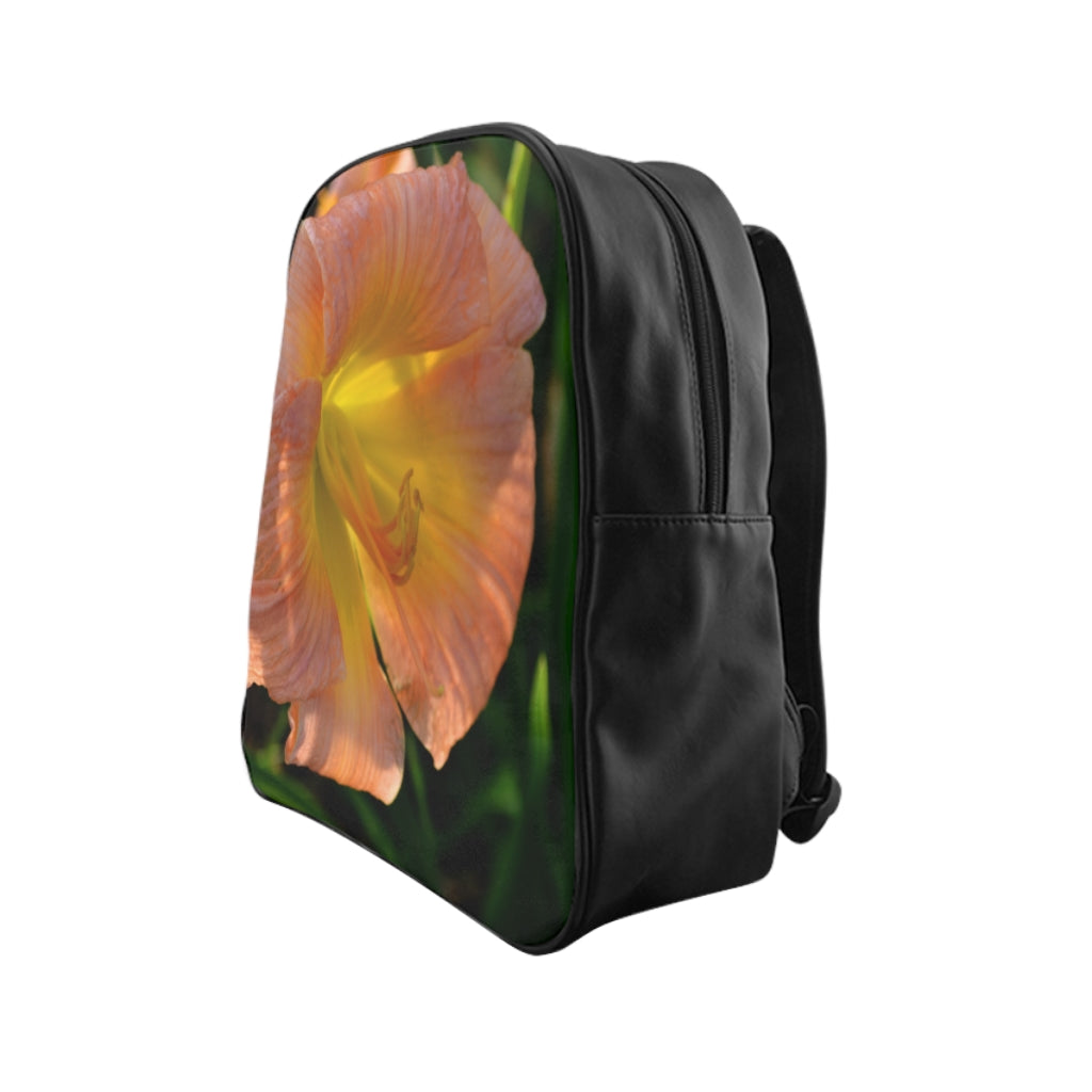 Peach and yellow floral school backpack with padded back and chocolate brown lining, perfect for students.