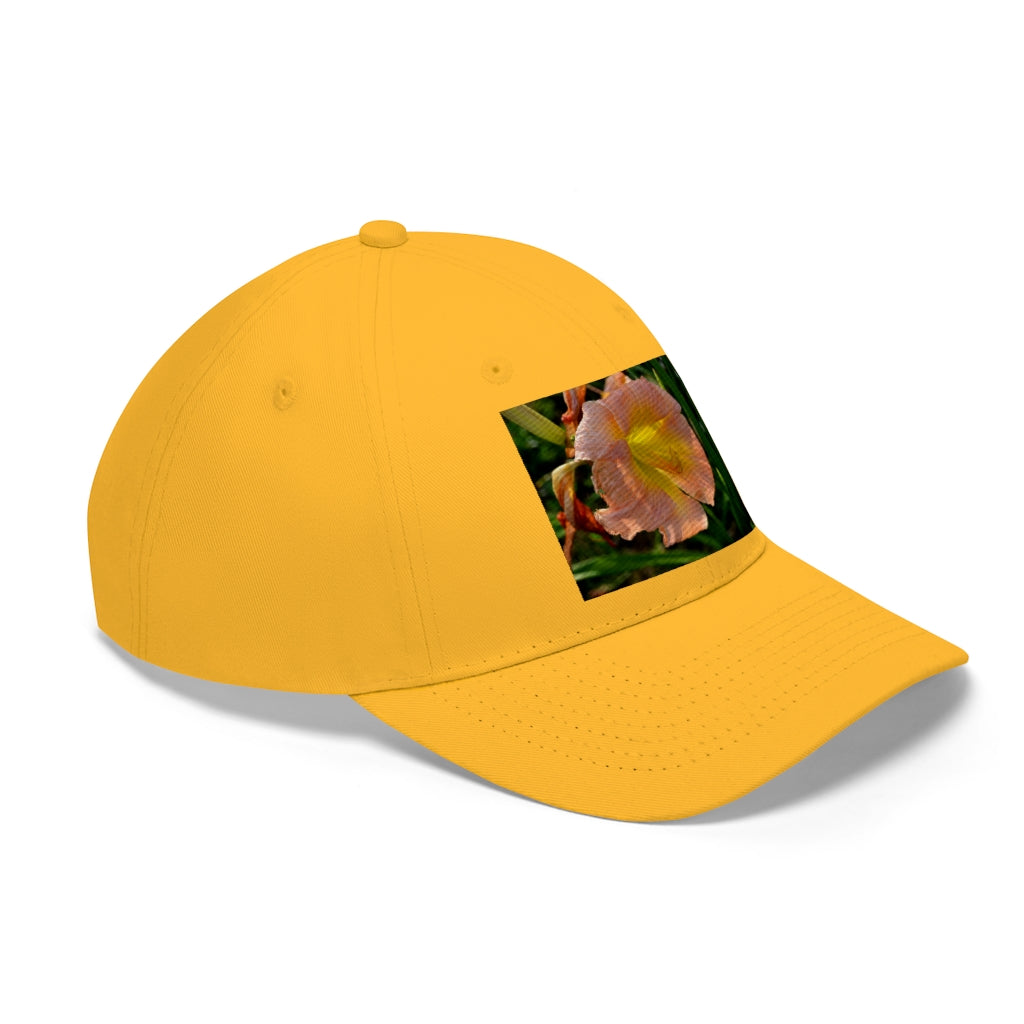 Peach and yellow flower unisex twill hat with adjustable Velcro closure and classic 6-panel design.