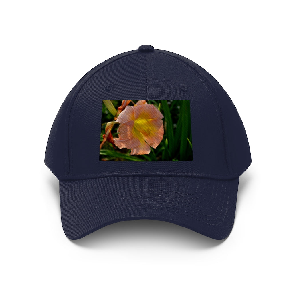 Peach and yellow flower unisex twill hat with adjustable Velcro closure and classic 6-panel design.