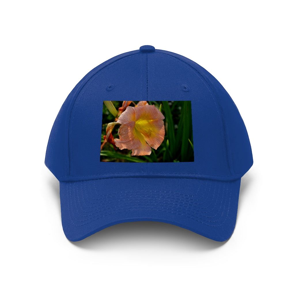 Peach and yellow flower unisex twill hat with adjustable Velcro closure and classic 6-panel design.