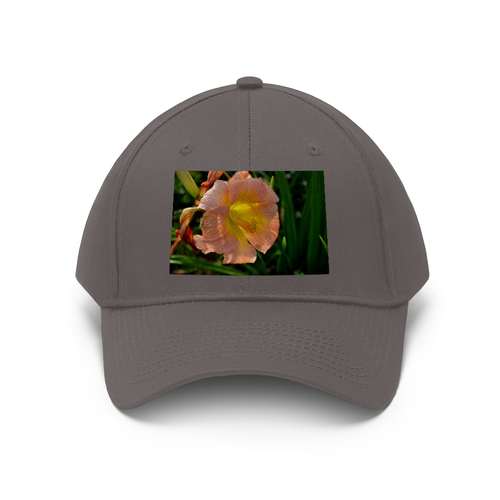 Peach and yellow flower unisex twill hat with adjustable Velcro closure and classic 6-panel design.