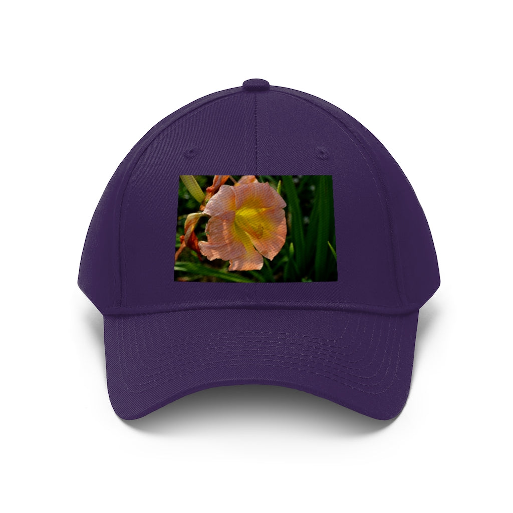 Peach and yellow flower unisex twill hat with adjustable Velcro closure and classic 6-panel design.