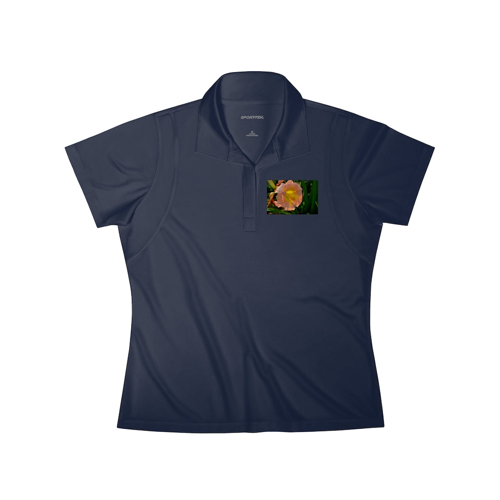 A stylish Peach and Yellow Flower Women's Polo Shirt featuring a lightweight design and tapered neck, perfect for various occasions.