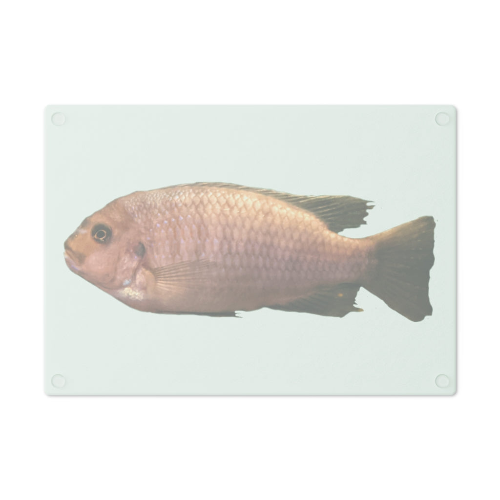 A stylish Peach Fish Cutting Board made of tempered glass, featuring a vibrant peach fish design and four rubber dots for stability.