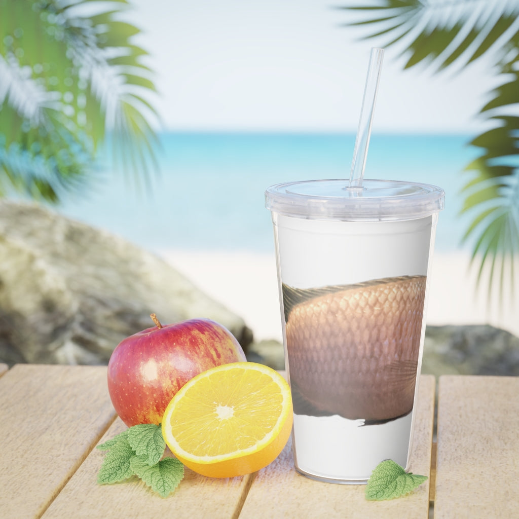 A vibrant Peach Fish Plastic Tumbler with Straw, showcasing its colorful design and double wall insulation.