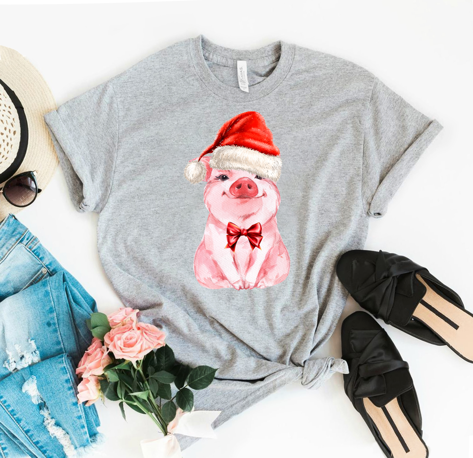 A festive Pig Christmas T-shirt made from premium ring spun cotton, featuring a vibrant design perfect for holiday celebrations.