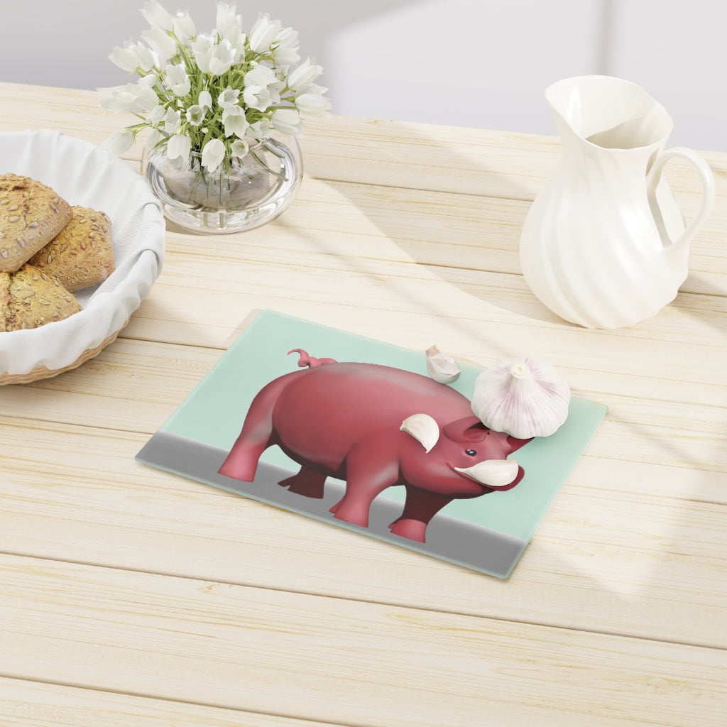 A stylish Pig Cutting Board made of tempered glass, featuring a charming pig design and rubber dots for stability.