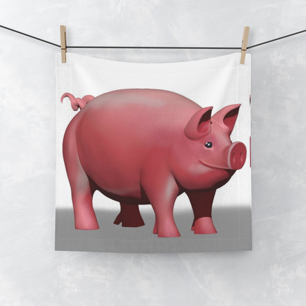 A colorful pig face towel featuring a vibrant design on a soft polyester front and absorbent cotton back, perfect for bathroom use.