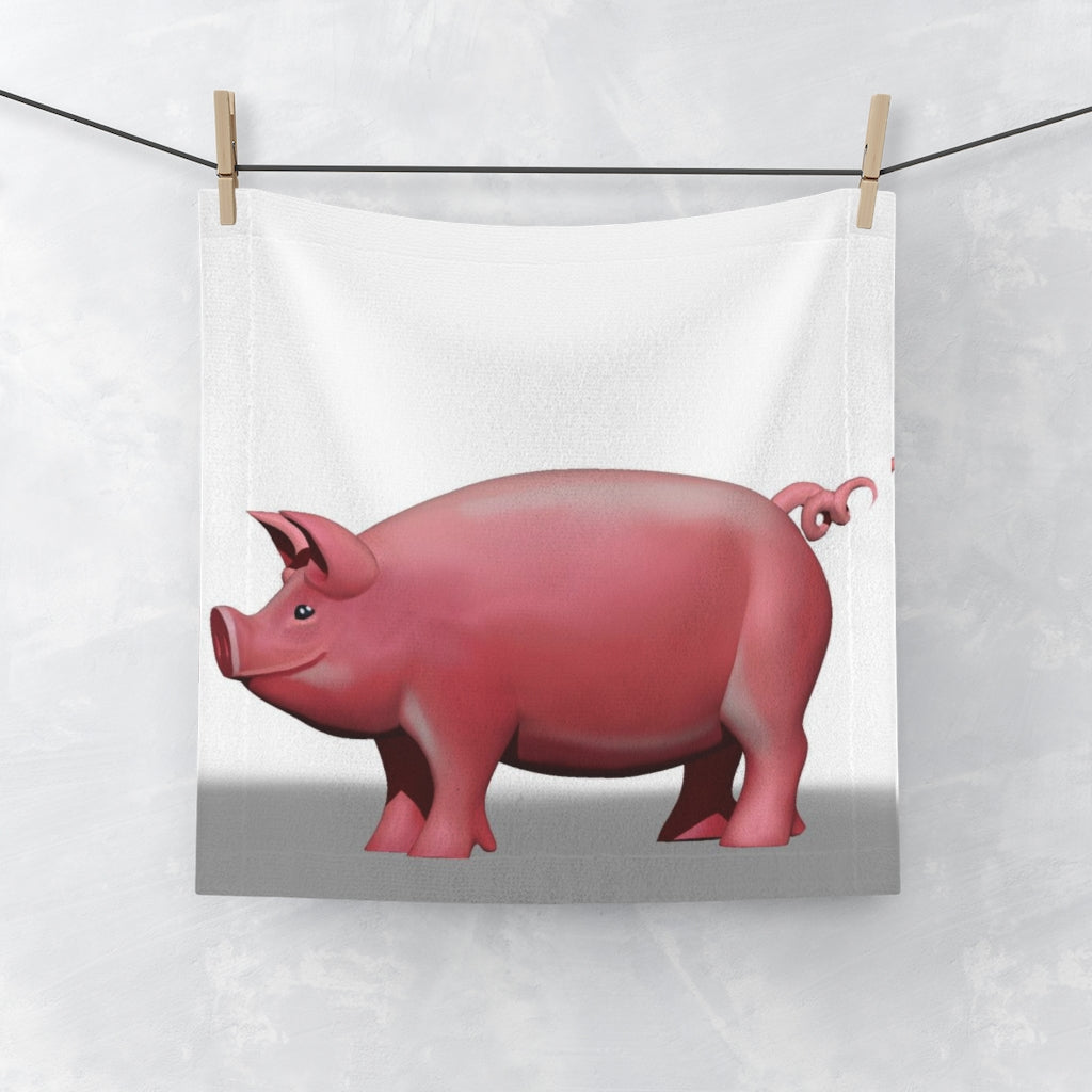 A colorful Pig Face Towel featuring a vibrant design on a polyester front and soft cotton back, perfect for personalizing your bathroom.