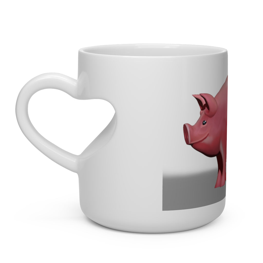 A white ceramic mug shaped like a heart with a heart-shaped handle, perfect for hot beverages.