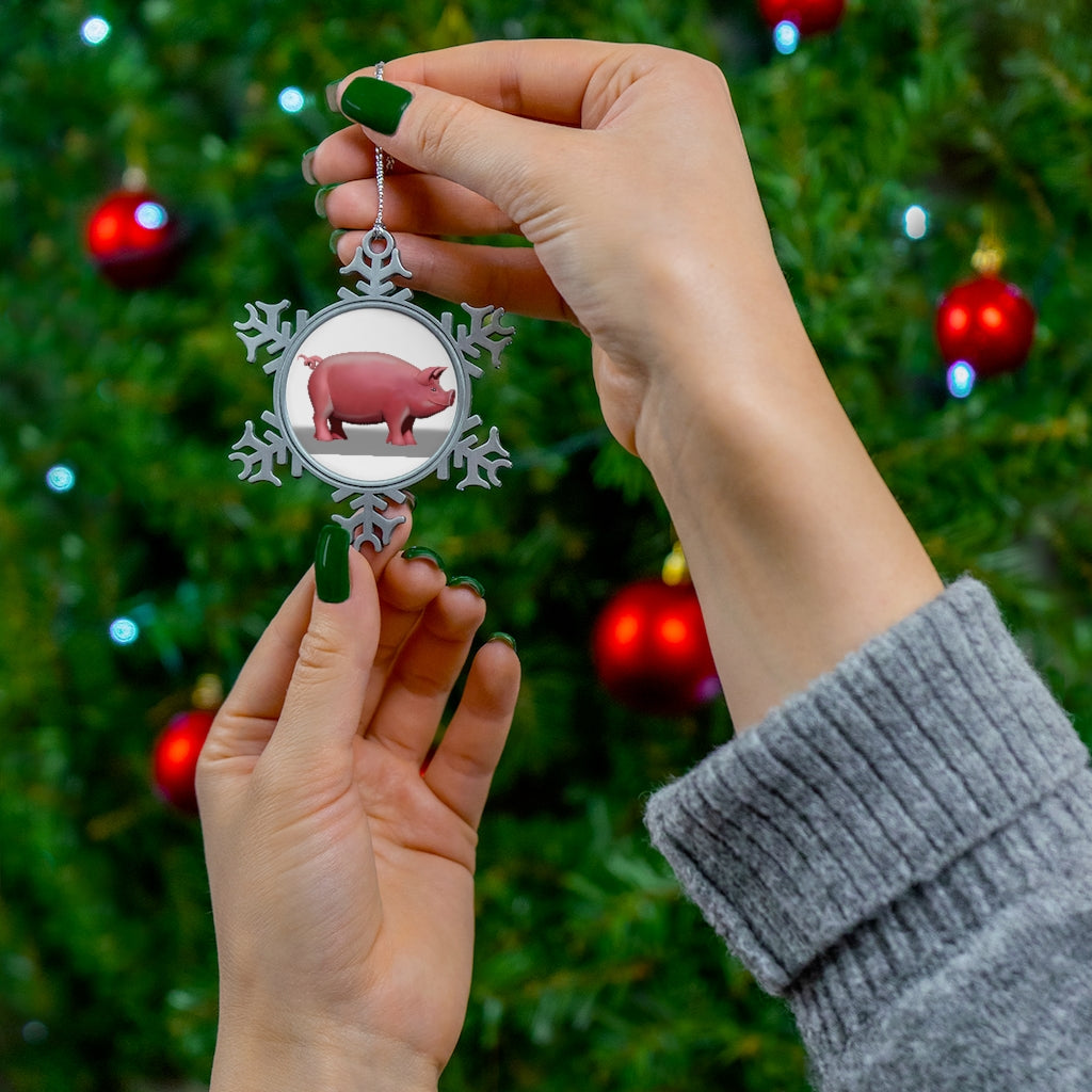 A beautifully crafted Pig Pewter Snowflake Ornament featuring a unique snowflake design and silver-toned hanging string.