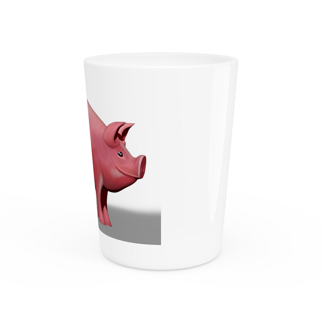 A personalized Pig Shot Glass made of white ceramic with a customizable design, featuring a black interior.