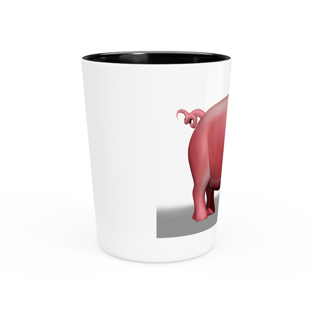 A personalized Pig Shot Glass made of white ceramic with a customizable design, featuring a black interior.