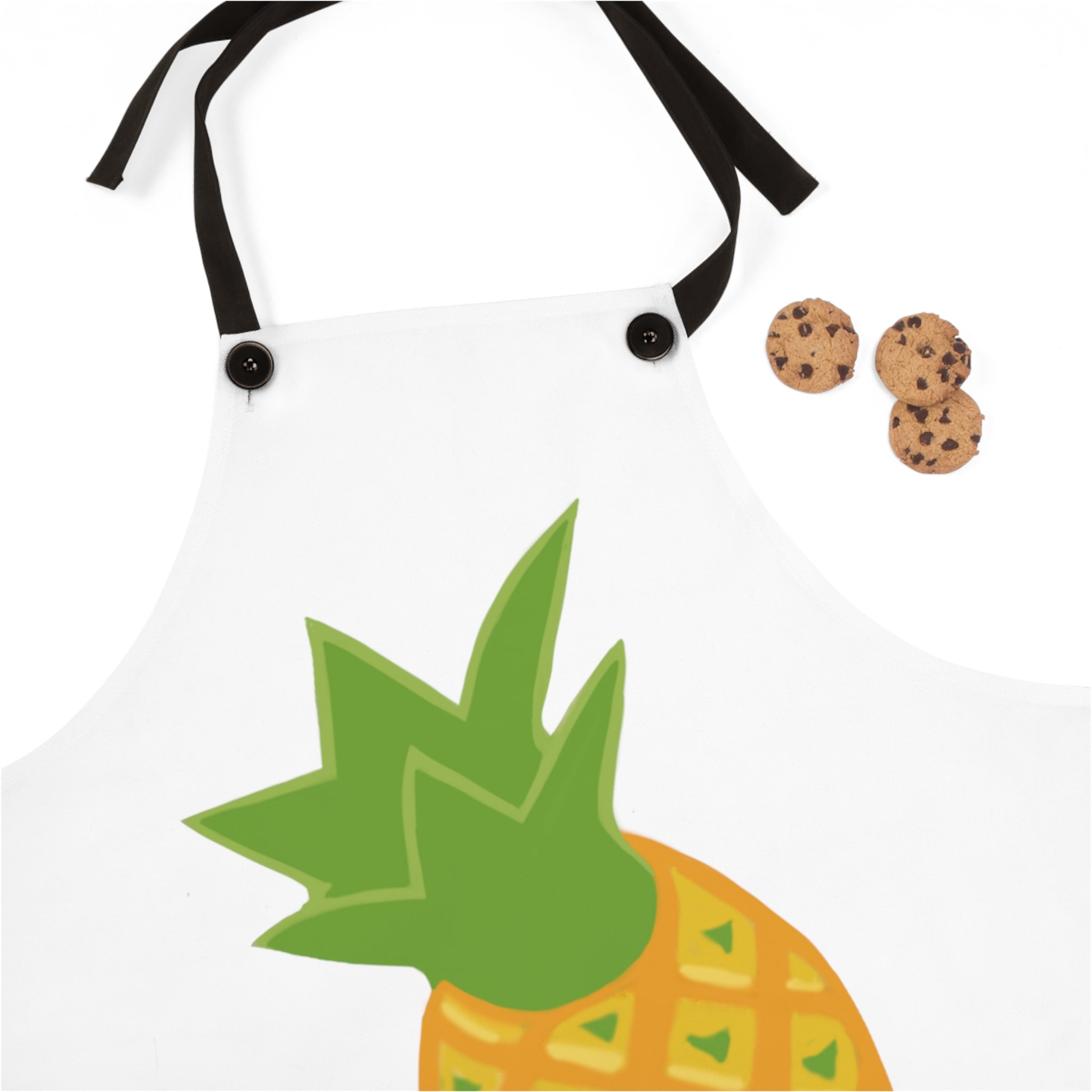 A vibrant Pineapple Apron featuring a tropical design, lightweight polyester fabric, and black detachable twill straps, perfect for cooking.