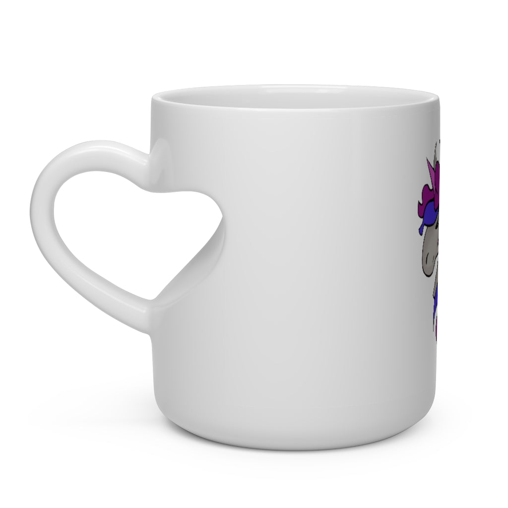 A whimsical pink and blue unicorn heart-shaped mug with a heart-shaped handle, perfect for hot beverages.