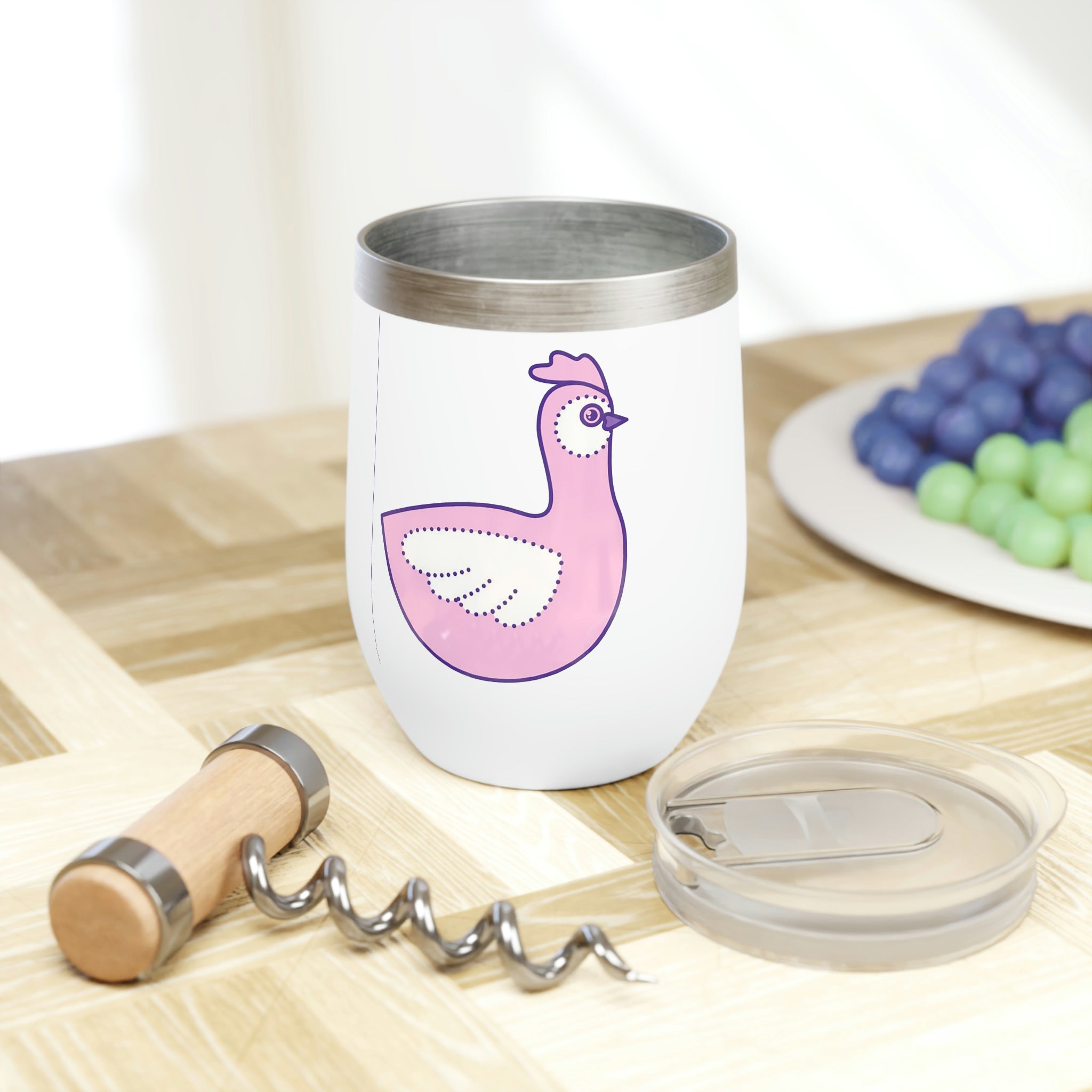 Pink and purple bird design on a stainless steel wine tumbler, showcasing its stylish and durable features.