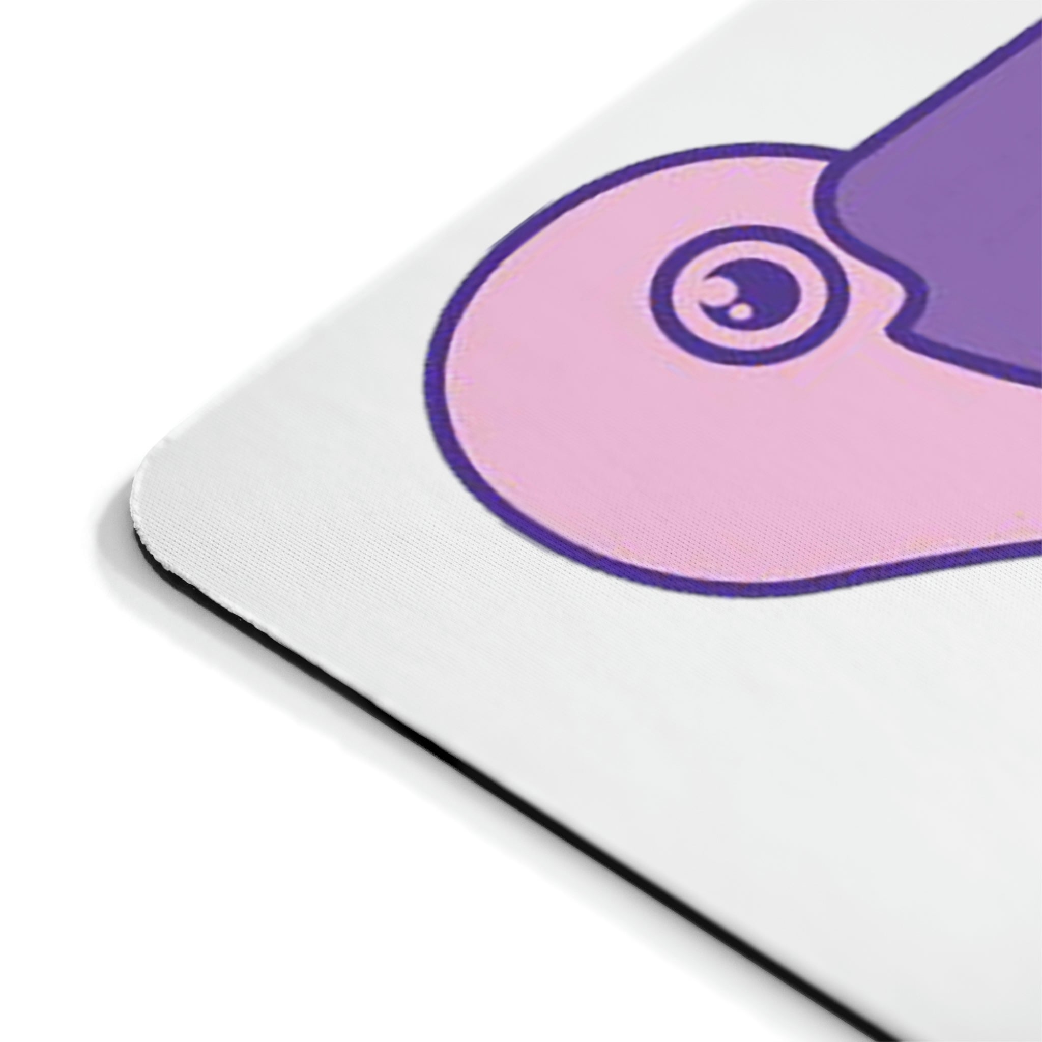 A vibrant pink and purple bird mouse pad featuring a colorful design, perfect for enhancing any workspace.