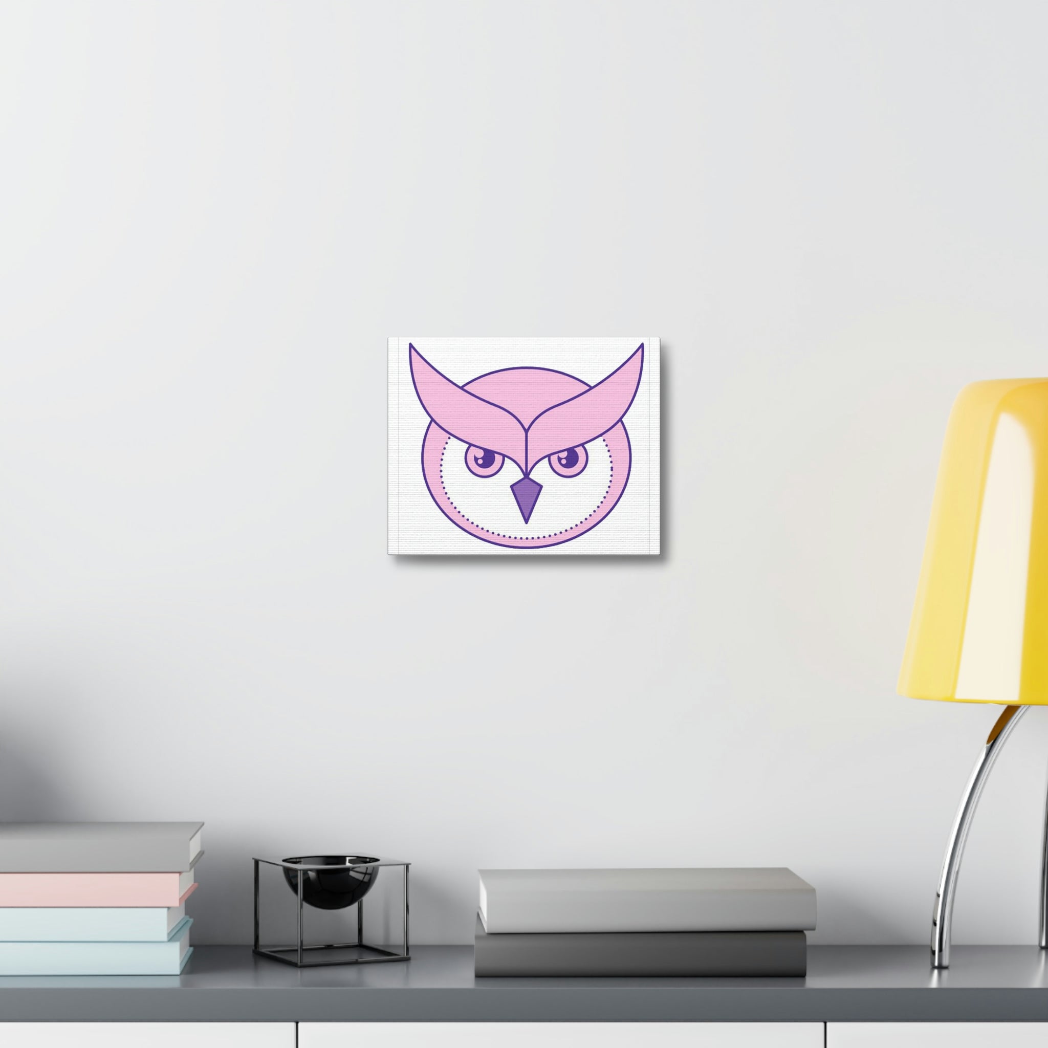 A vibrant pink and purple bird design printed on a stretched canvas, showcasing intricate details and vivid colors.