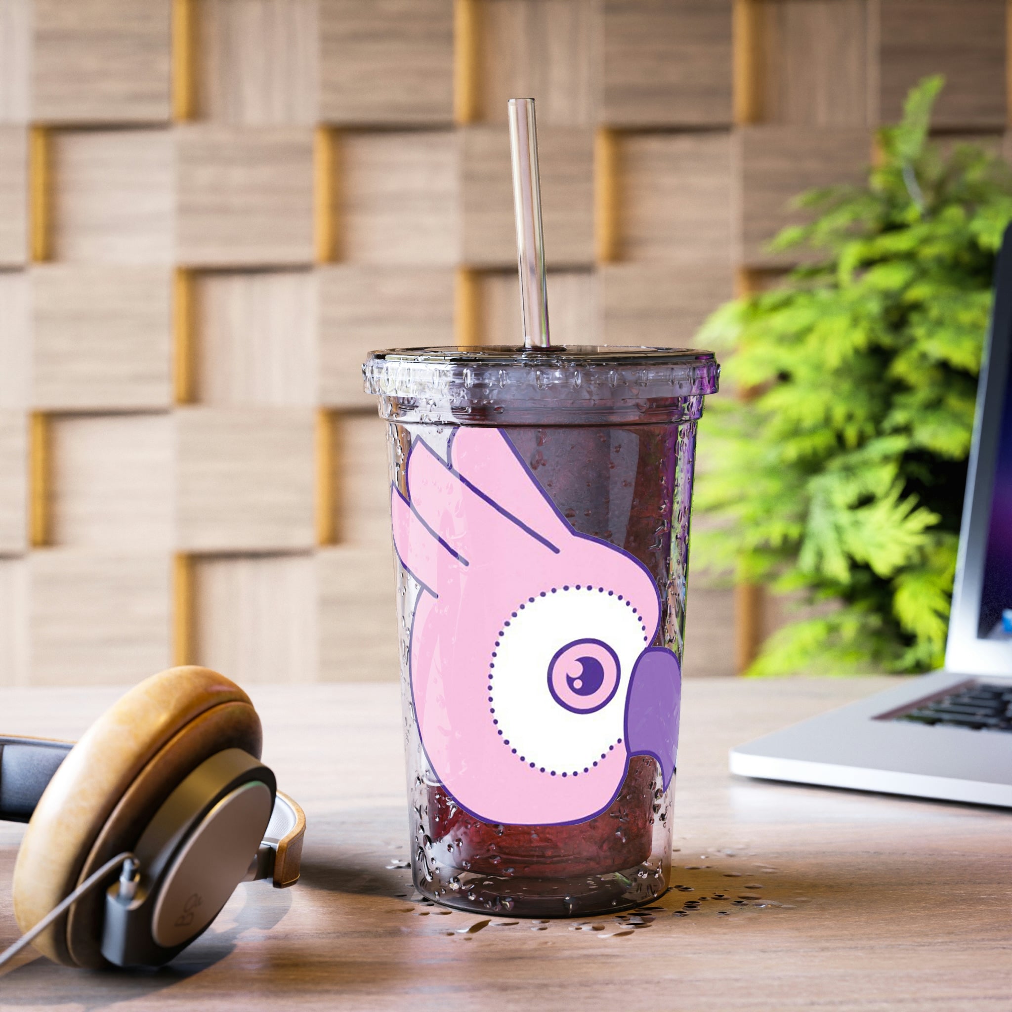 Pink and purple stainless steel tumbler with a straw, showcasing a vibrant bird design.