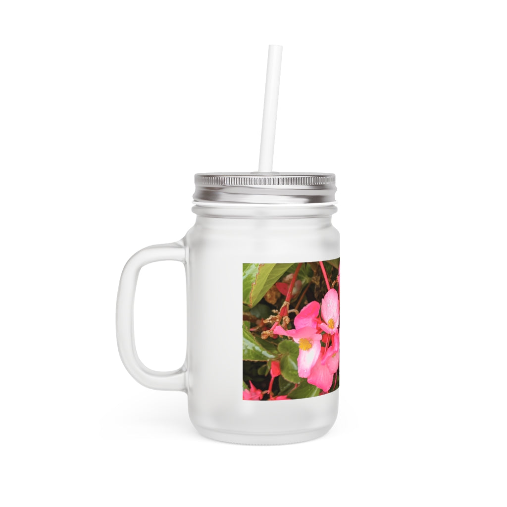 A stylish Pink Flower Mason Jar made of frosted glass, featuring a lid and straw, perfect for personalized beverages.