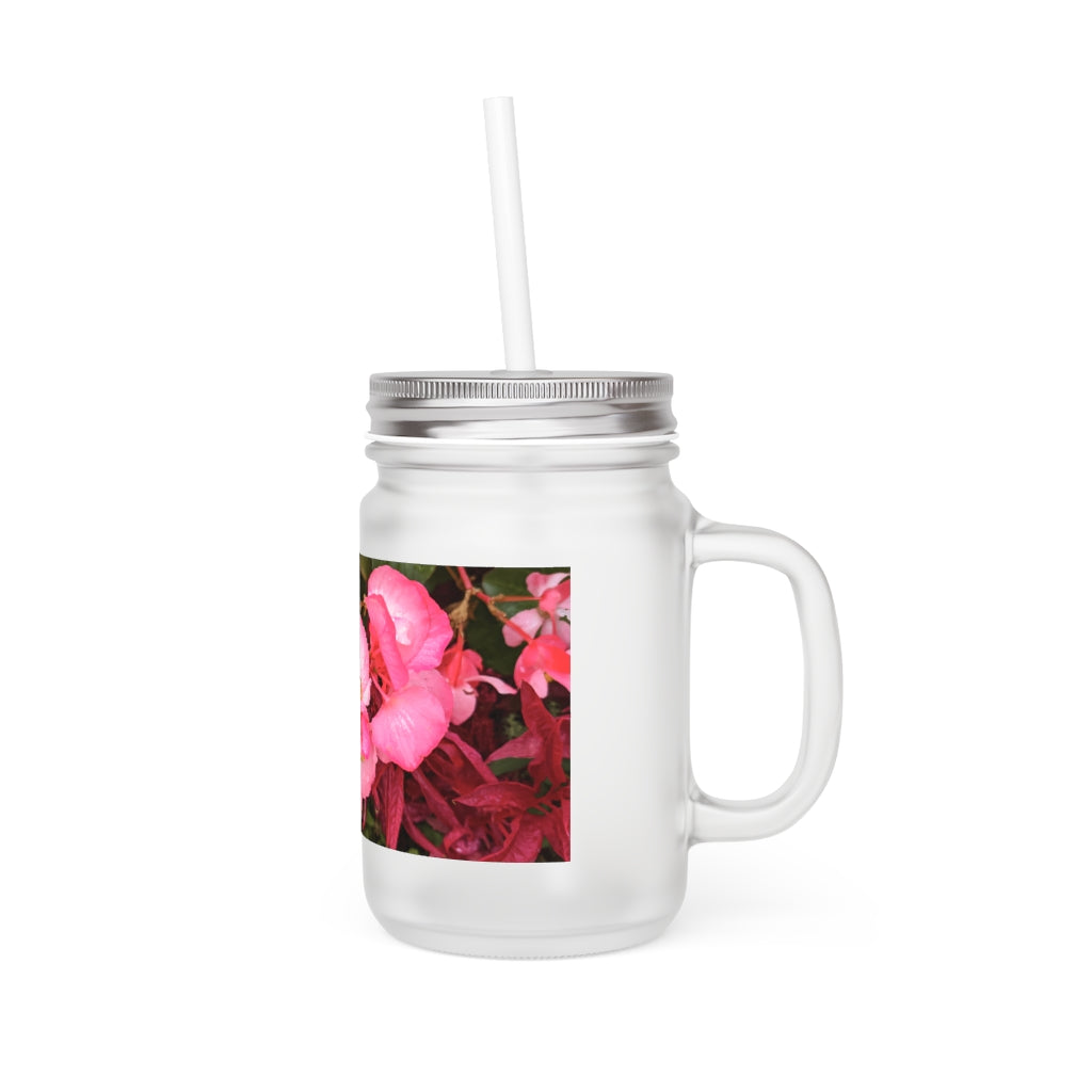 A stylish Pink Flower Mason Jar made of frosted glass, featuring a lid and straw, perfect for personalized beverages.