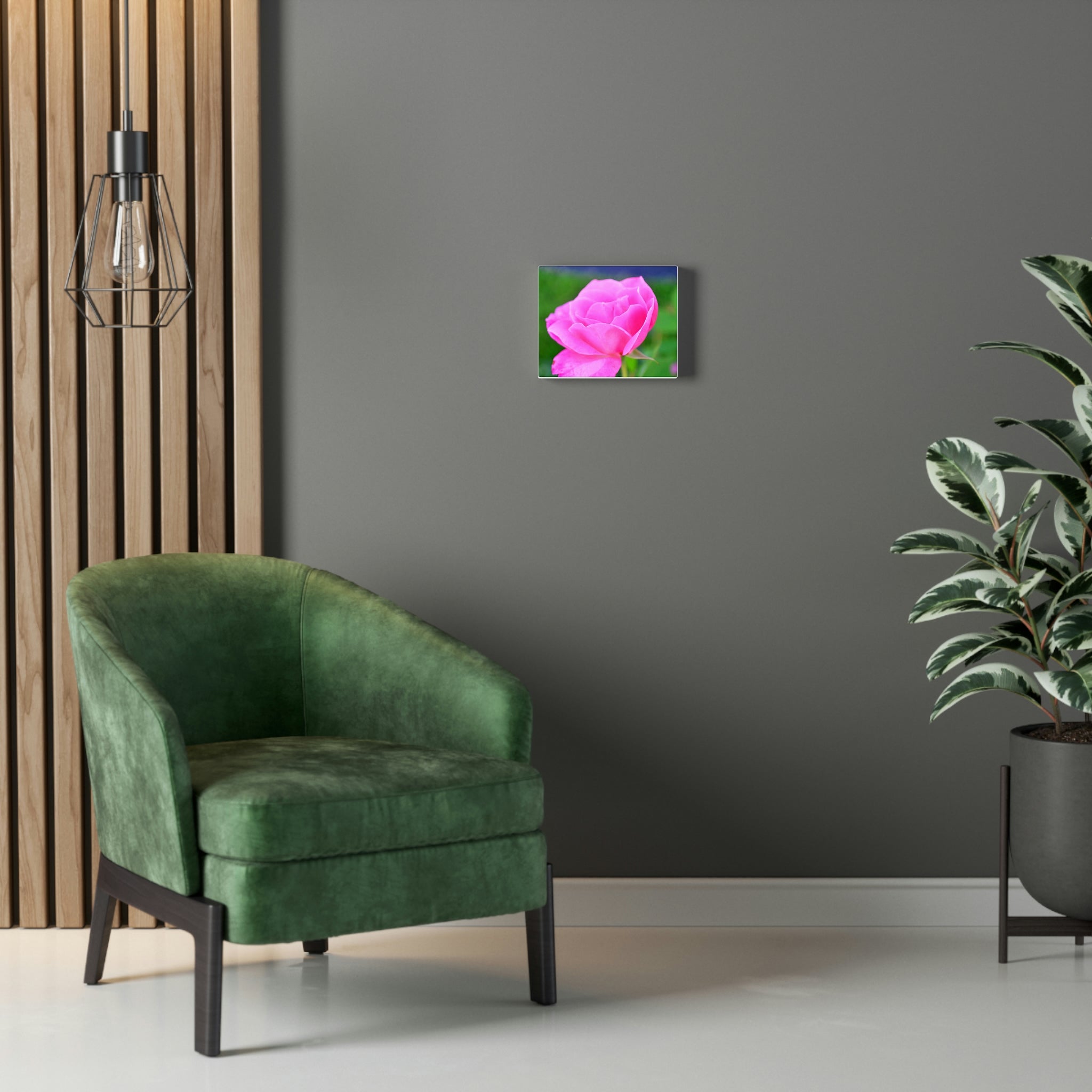 A vibrant pink flower stretched canvas art piece, elegantly framed and ready for indoor display.