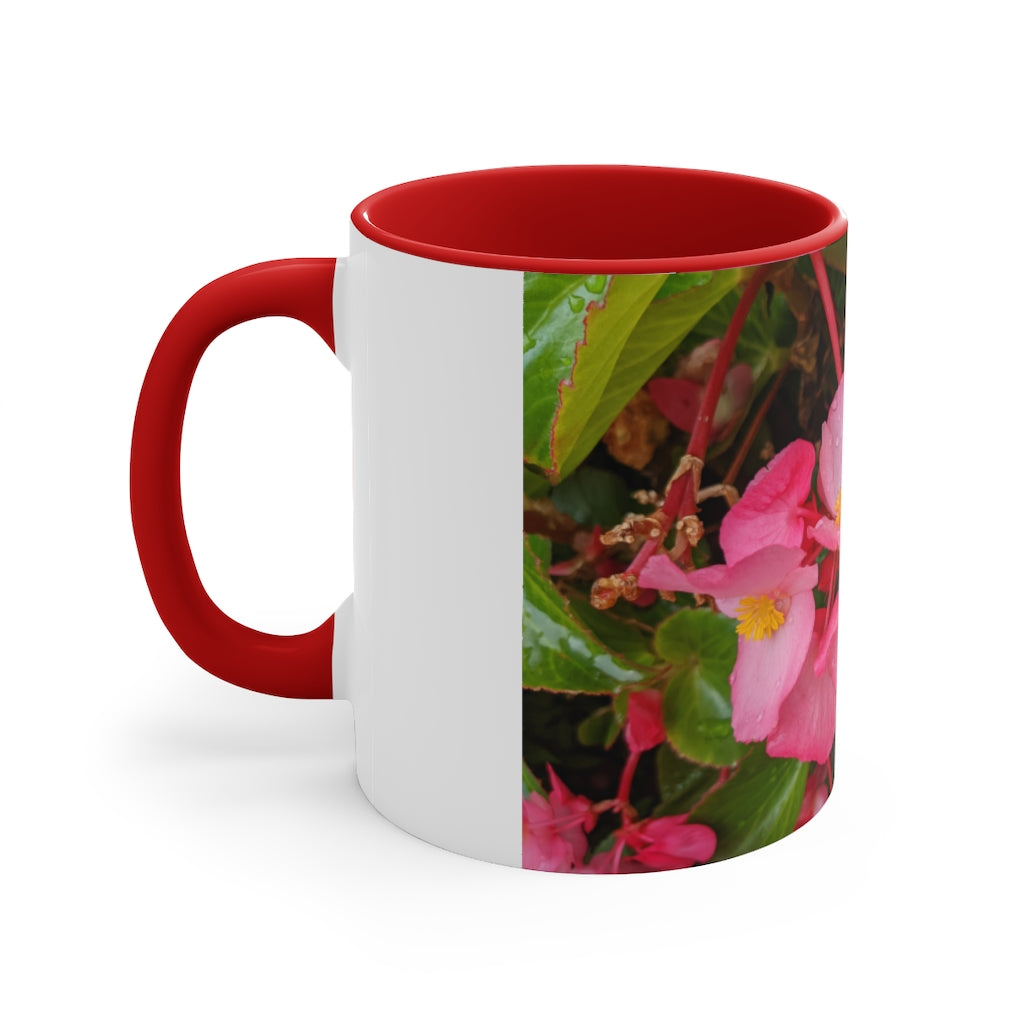 A vibrant pink flowers accent coffee mug with a white ceramic body and a contrasting colored interior and handle, showcasing its stylish design.