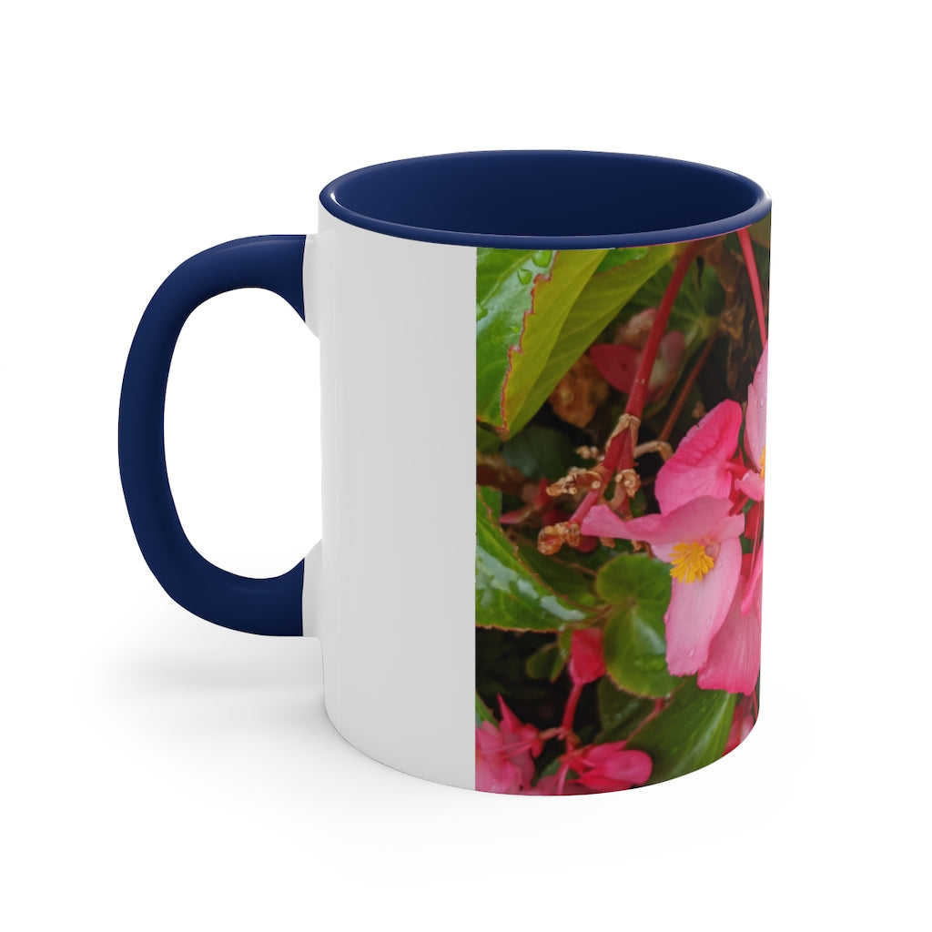 A vibrant pink flowers accent coffee mug with a white ceramic body and a contrasting colored interior and handle, showcasing its stylish design.