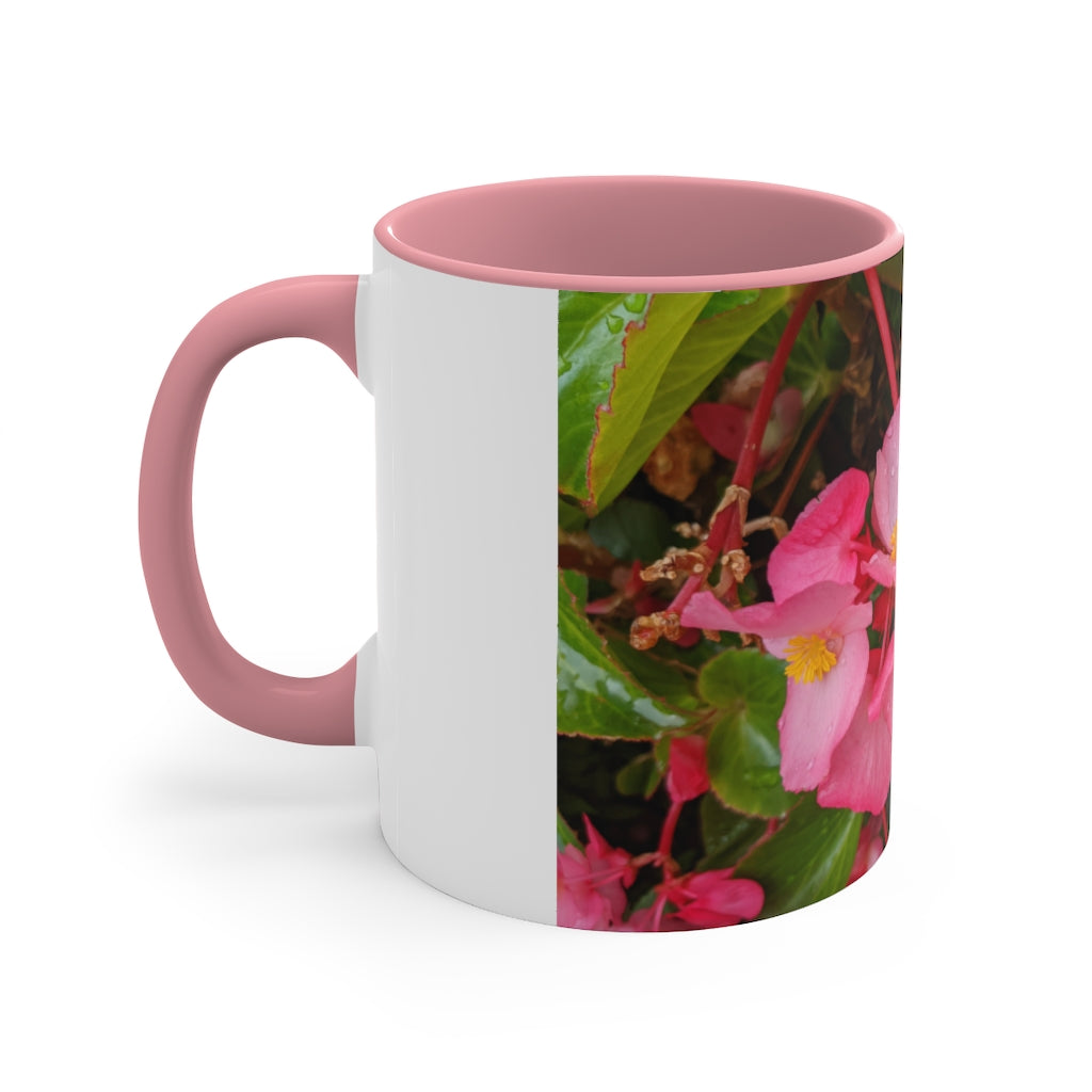 A vibrant pink flowers accent coffee mug with a white ceramic body and a contrasting colored interior and handle, showcasing its stylish design.