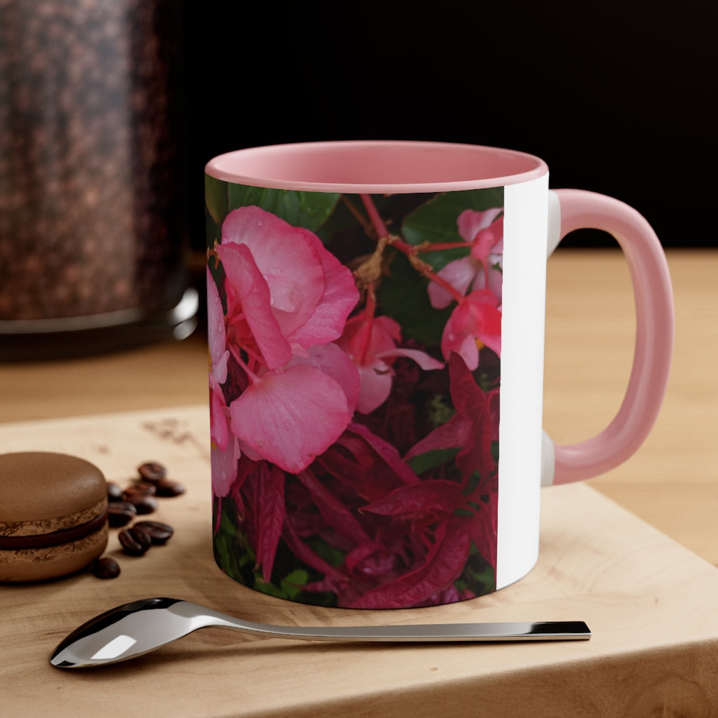 A vibrant pink flowers accent coffee mug with a white ceramic body and a contrasting colored interior and handle, showcasing its stylish design.