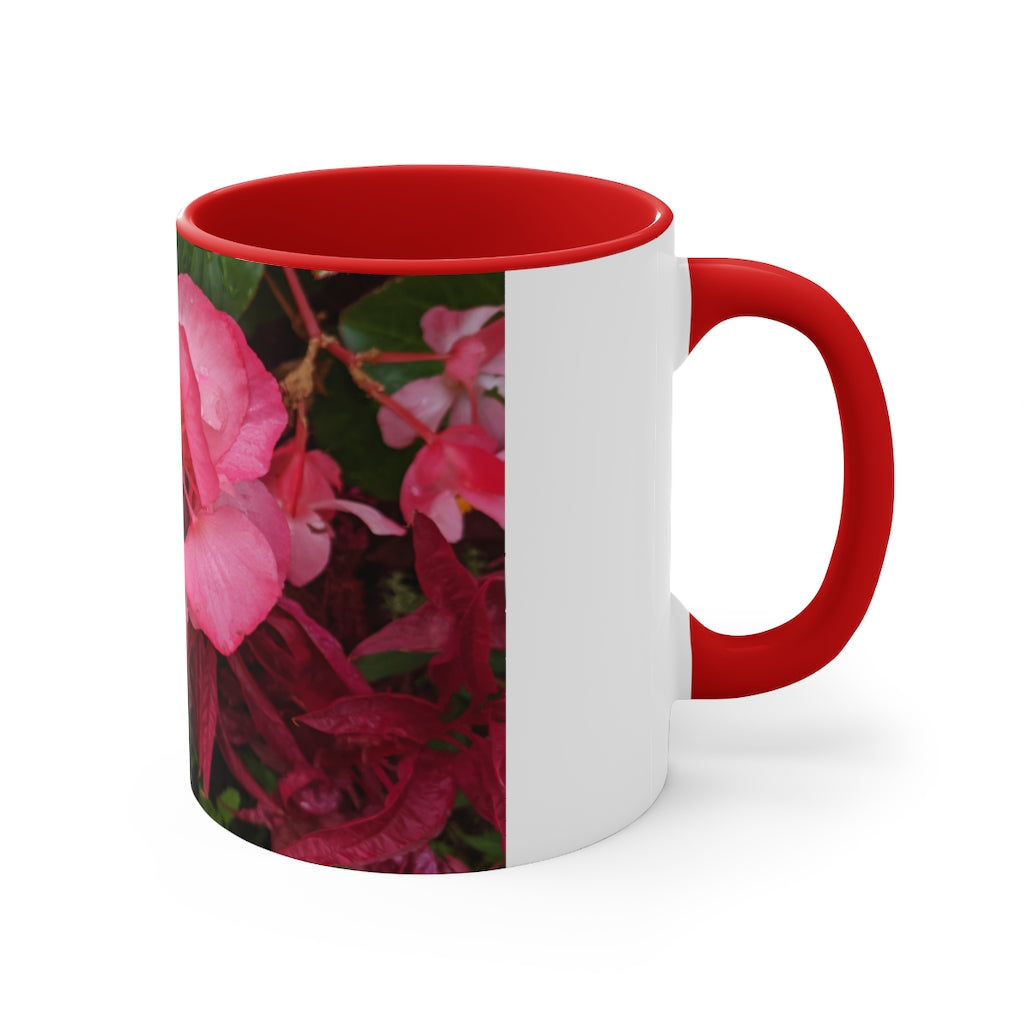 A vibrant pink flowers accent coffee mug with a white ceramic body and a contrasting colored interior and handle, showcasing its stylish design.