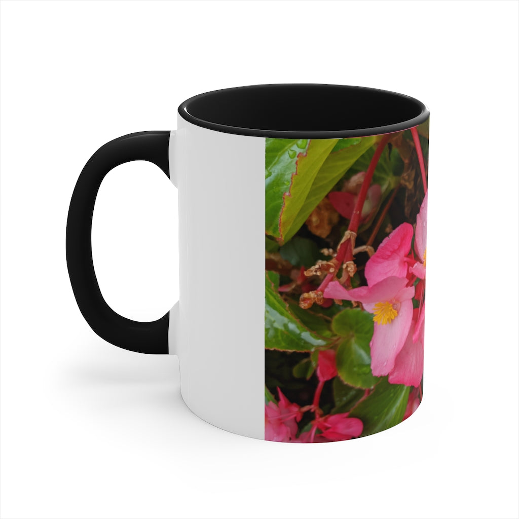 A vibrant pink flowers accent coffee mug with a white ceramic body and a contrasting colored interior and handle, showcasing its stylish design.