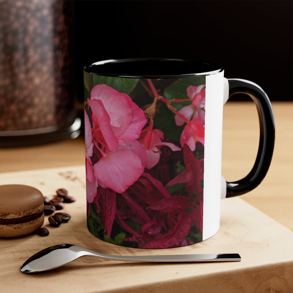 A vibrant pink flowers accent coffee mug with a white ceramic body and a contrasting colored interior and handle, showcasing its stylish design.