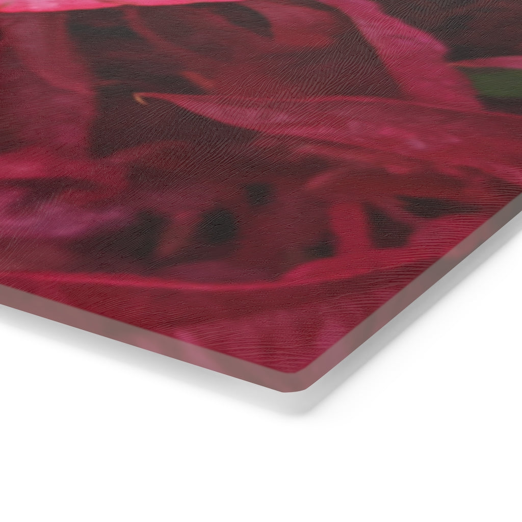 A stylish Pink Flowers Cutting Board made of tempered glass with a floral design and rubber dots for stability.