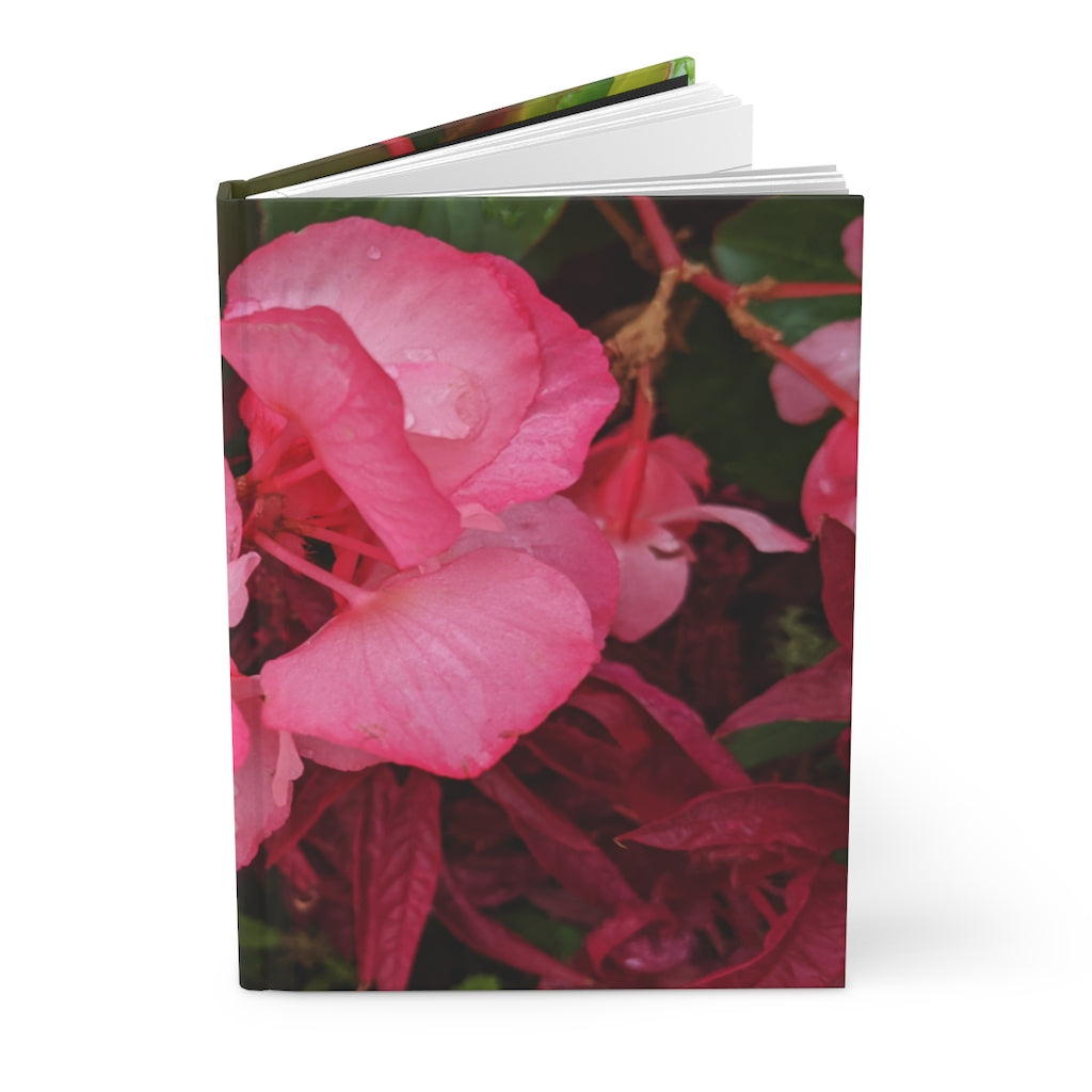 Pink Flowers Hardcover Journal with matte finish, featuring a floral design on the cover and lined pages inside.